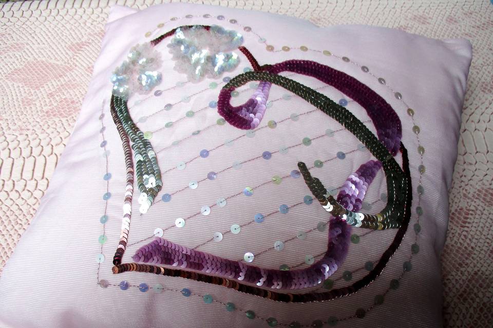 Coussin rose pour alliances