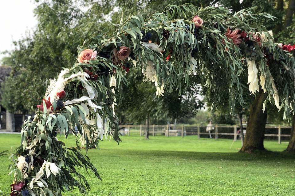 Arche fleurie fleurs/raison