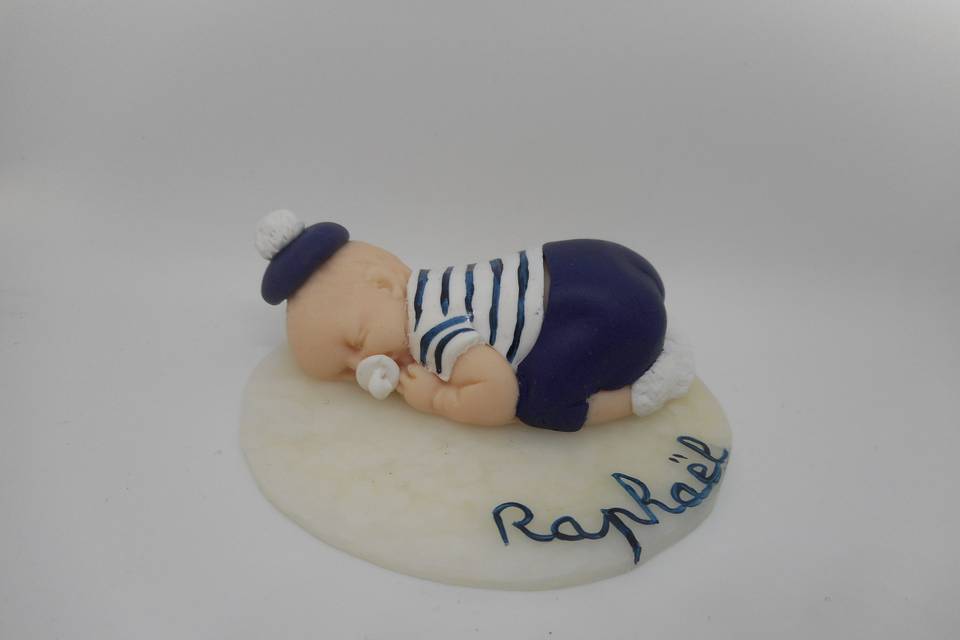 Figurine bébé marin